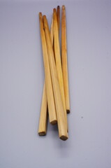 Bamboo Sticks for Crafting and Cooking on Light Background