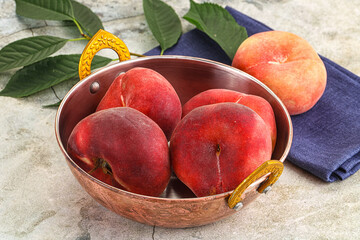 Ripe sweet and juicy Flat peach
