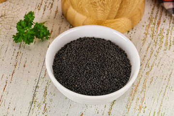 Black dry Nigella seeds in the bowl
