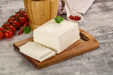 Soft Feta cheese piece with cut