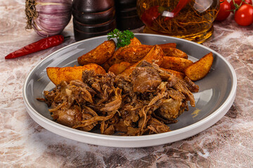 Baked shredded pork with potato