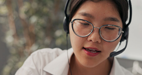 Telecommunications operator, customer advisor, elegant woman with glasses working in insurance,...