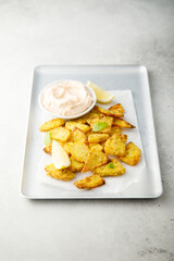 Roasted potato triangles with dip