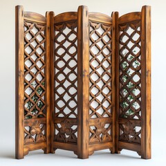 A four-panel wooden room divider with a carved lattice design and green vines.