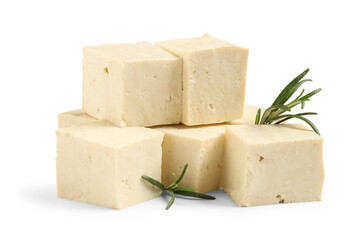 Cut tofu cheese and rosemary twigs isolated on white background