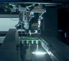 Circuit board moving through assembly line. Electronics component installation, CMD. Automated