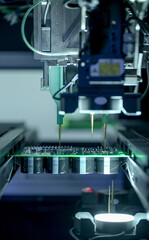 Circuit board moving through assembly line. Electronics component installation, CMD. Automated