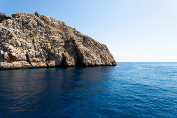The rocky coastline of the island, in the middle of the sea in Turkey. The seascape is mesmerizing with its view and the beauty of nature.