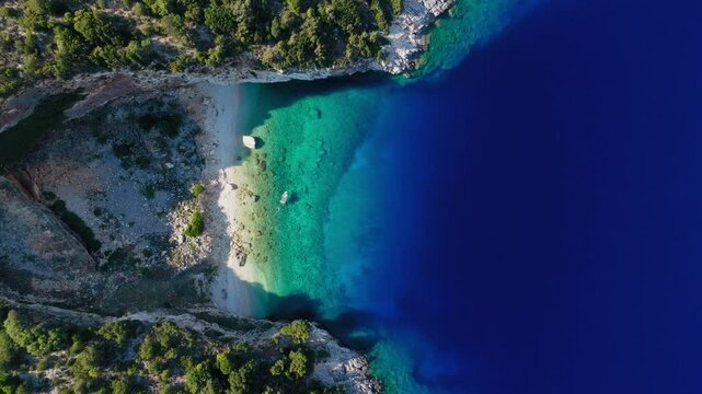 Coastline near Hulla Beach with turquoise bay and forest, Ithaca Island, Greece