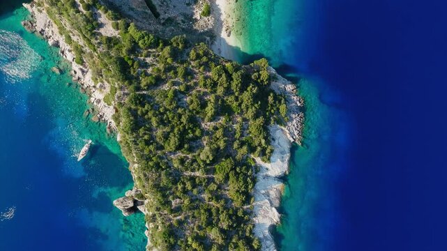 Aerial wide of Hulla Beach and surrounding forest on Ithaca Island, Greece