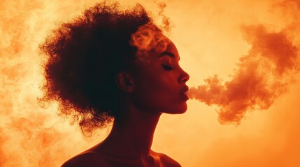 Woman with afro exhaling orange smoke against fiery backdrop.