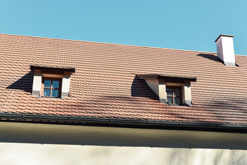 Czech traditional old style house rooftop made of red tiles