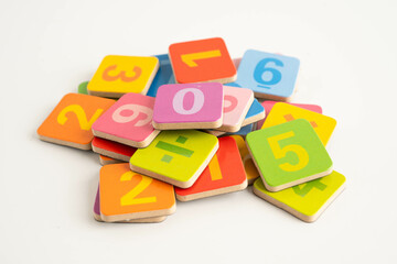 Number wood block cubes for learning Mathematic, education math concept.
