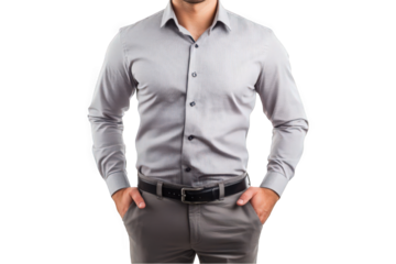 Stylish man in a fitted gray shirt with hands in pockets exuding confidence.