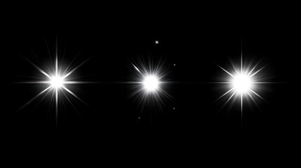 Three bright starburst light effects isolated on black background. (1)