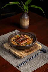 Savory asian cuisine delight cozy restaurant food photography warm atmosphere close-up view culinary artistry for food lovers