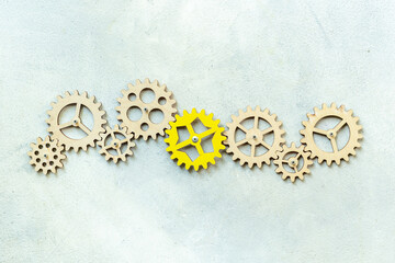 One cogwheel matches to chain of gears. New team member or new idea concept