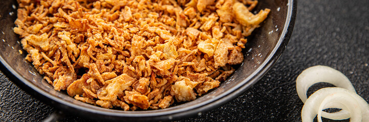 Fried onion crispy onions appetizer vegetables dish fresh delicious gourmet food background on table rustic food top view copy space vegetarian and vegan food