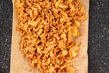 Fried onion crispy onions appetizer vegetables dish fresh delicious gourmet food background on table rustic food top view copy space vegetarian and vegan food