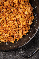 Fried onion crispy onions appetizer vegetables dish fresh delicious gourmet food background on table rustic food top view copy space vegetarian and vegan food