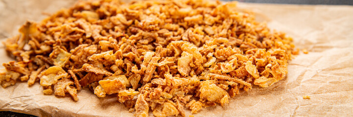 Fried onion crispy onions appetizer vegetables dish fresh delicious gourmet food background on table rustic food top view copy space vegetarian and vegan food