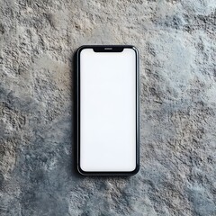 A sleek smartphone with a clean, blank display rests on a textured, gray stone surface, offering a minimalist and modern aesthetic.