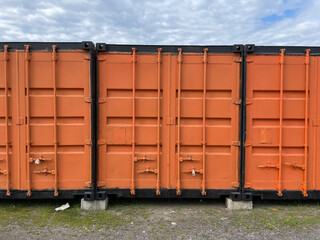 Orange Shipping Containers and Blue Sky