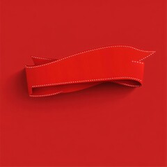 A red ribbon with white stitching on a matching red background surface