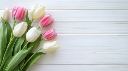 Flat Lay of Pink and White Tulips with Blank Card on White Wooden Background for Spring Greeting Design