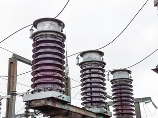 Power plant equipment for industrial energy distribution. High voltage substation insulator. Electricity infrastructure, transmission facilities, high power electrical supply