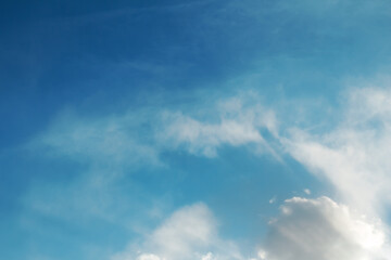 Bright blue sky with white clouds. Natural scenic background
