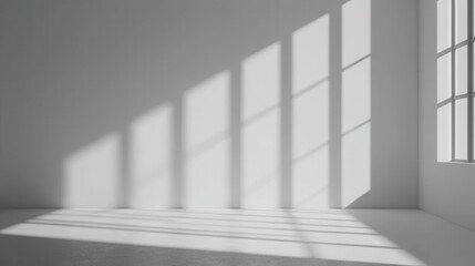 Obraz premium Minimalist Interior with Sunlight Casting Shadows on White Walls