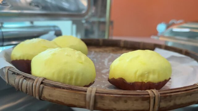 Bao bun in plastic container. Asian street food concept