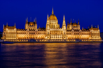 Fototapeta premium Budapest collection - Budapest illuminated parliament with long exposure in the blue hours