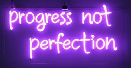 Obraz premium Bright purple neon sign displays text. Message promotes growth over flawless results. Simple, modern aesthetic.