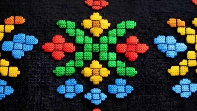 Vibrant Cross-Stitch Embroidery on Dark Fabric - Detailed Close-Up