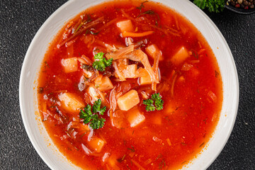 Soup vegetables red borscht first course vegetable dish fresh delicious gourmet food background on the table rustic food top view copy space keto and paleo diet vegetarian and vegan food