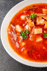 Soup vegetables red borscht first course vegetable dish fresh delicious gourmet food background on the table rustic food top view copy space keto and paleo diet vegetarian and vegan food