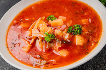 Soup vegetables red borscht first course vegetable dish fresh delicious gourmet food background on the table rustic food top view copy space keto and paleo diet vegetarian and vegan food