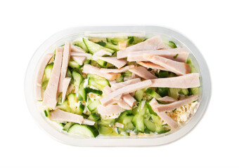 Mayonnaise salad in a lunch box with ham, chicken, cucumber on a white background, isolate. Ready-made food, close-up