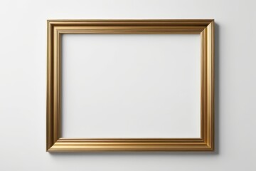 a close up of a golden frame on a white wall