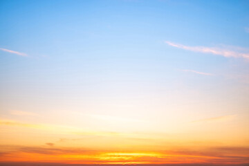 Beautiful , luxury soft gradient orange gold clouds and sunlight on the blue sky perfect for the background, take in evening,Twilight, Large size, high definition landscape photo