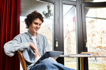 Relaxing at a cozy cafe while enjoying digital content on a tablet and sipping a warm beverage