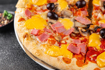 Pizza ham, mushrooms, olives, cheese appetizer vegetable dish fresh delicious gourmet food background on the table rustic food top view copy space