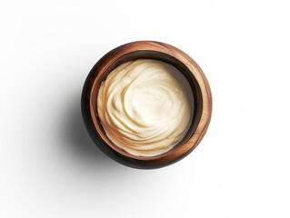 Creamy sauce served in a wooden bowl on a white background