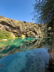Fototapeta premium Ain Sahlounout clear water spring in Southern Oman, Salalah