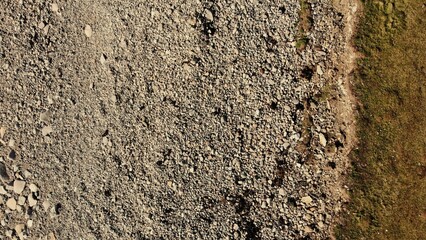 Aerial view and drone photography of multiple textures. Including rock filled and sunlit beach graphics.  