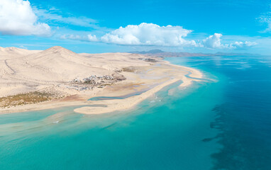 Stunning high aspect aerial panoramic view of the beautiful tropical looking beach, lagoon and sand dunes at Sotavento Risco del Paso beach near Costa Calma on Fuerteventura Canary Islands Spain