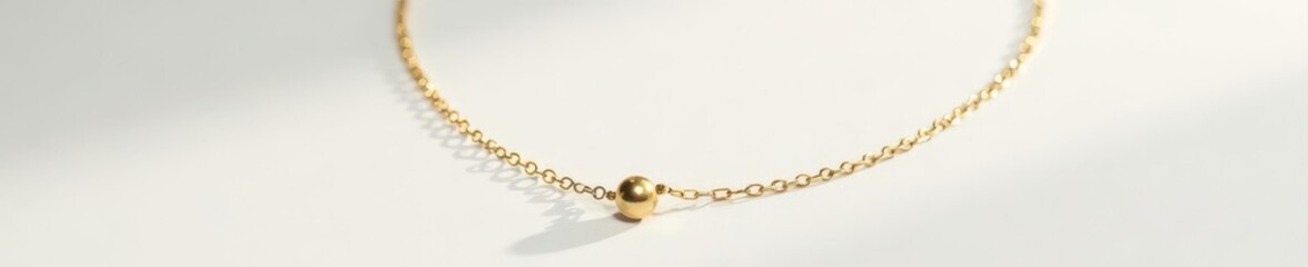 Delicate gold necklace on white background, ample copy space , elegant, necklace