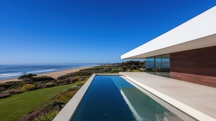 Modern Coastal House with Pool Overlooking Ocean and Beach Landscape